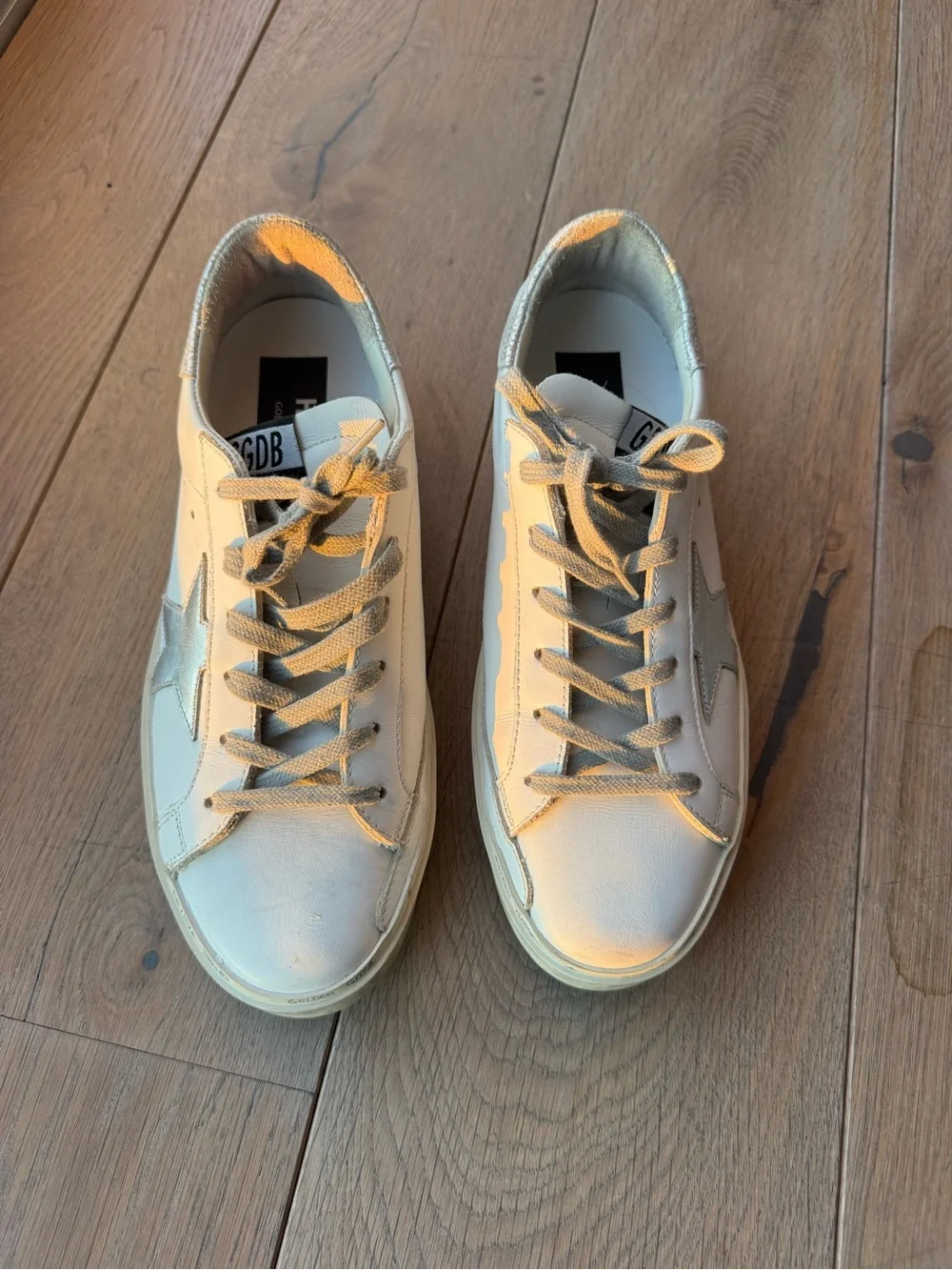 Golden Goose Hi Star with silver star and metallic silver heel